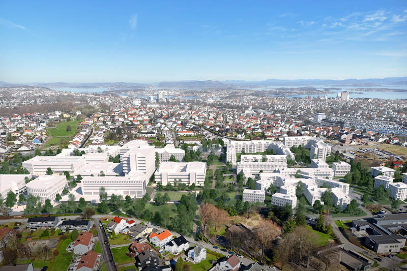 Utbygd planområde i fugleperspektiv. Nye bygg er markert med hvit farge og vi ser at en del av de gamle sykehusbyggene er beholdt, mens nye bygg, i samme høyde eller litt lavere, er kommet til. 